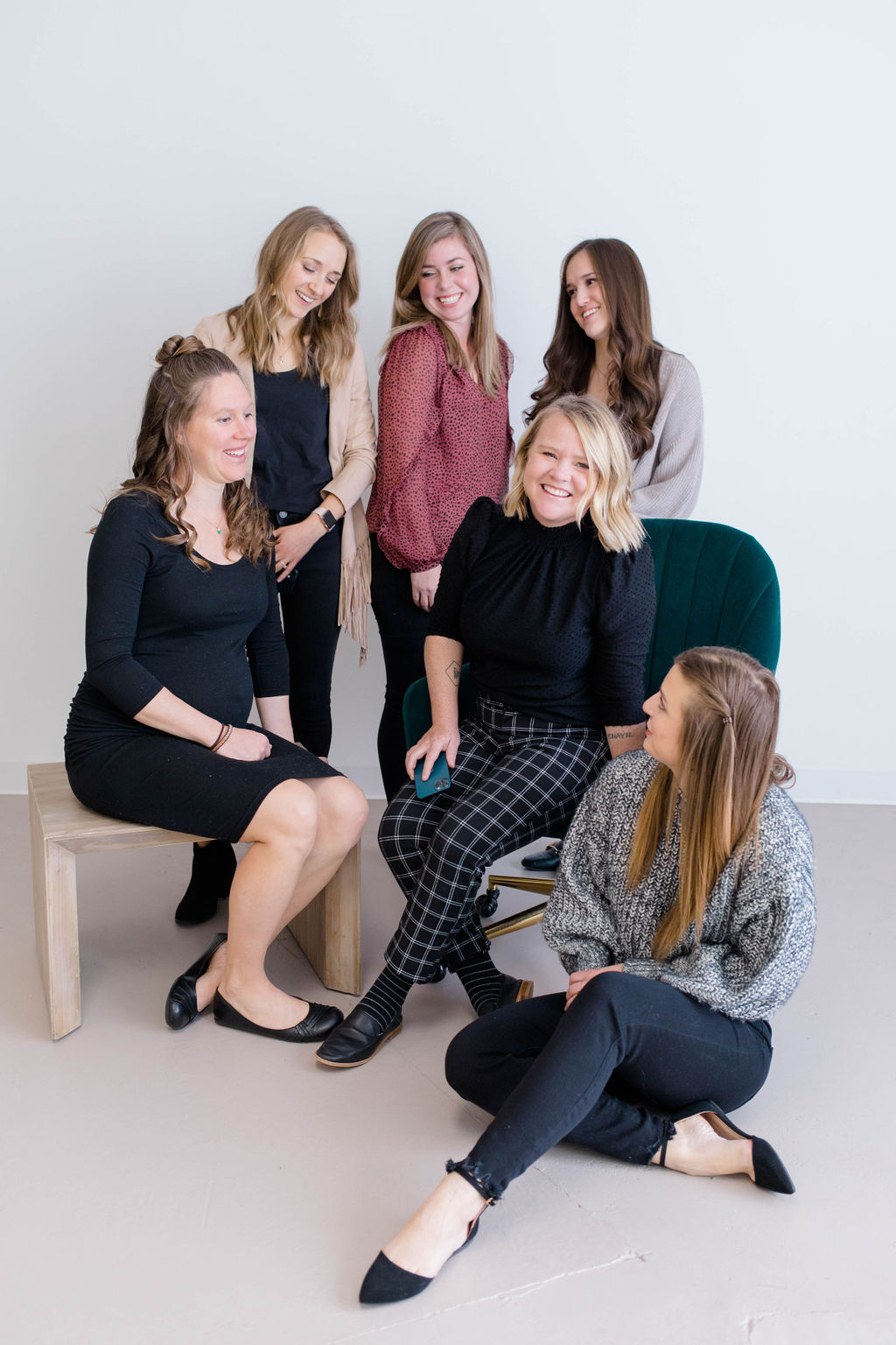 The Mina Company, a Women Owned Marketing Agency in Northern Colorado sits down for a team meeting to go over affordable seo packages, online marketing services and customized marketing strategies